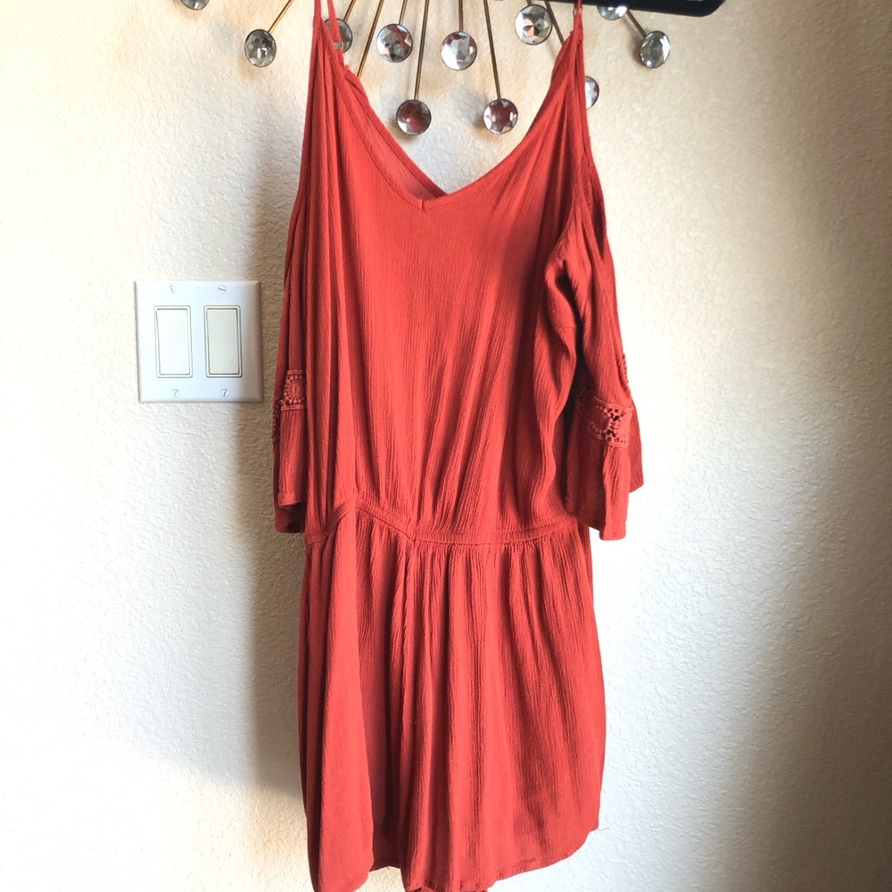 Target romper orange .